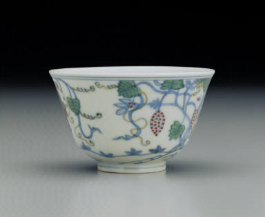 Cup with grape design in dou-cai enamels