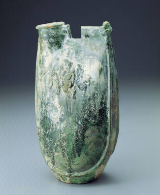 Green-glazed ewer in the shape of a leather pouch